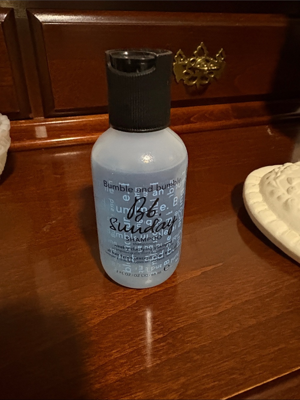 Bumble and bumble Light Blue Shampoo Bottle with Black Cap